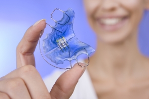 Beautiful Smiling Girl with Retainer for Teeth, Close-up